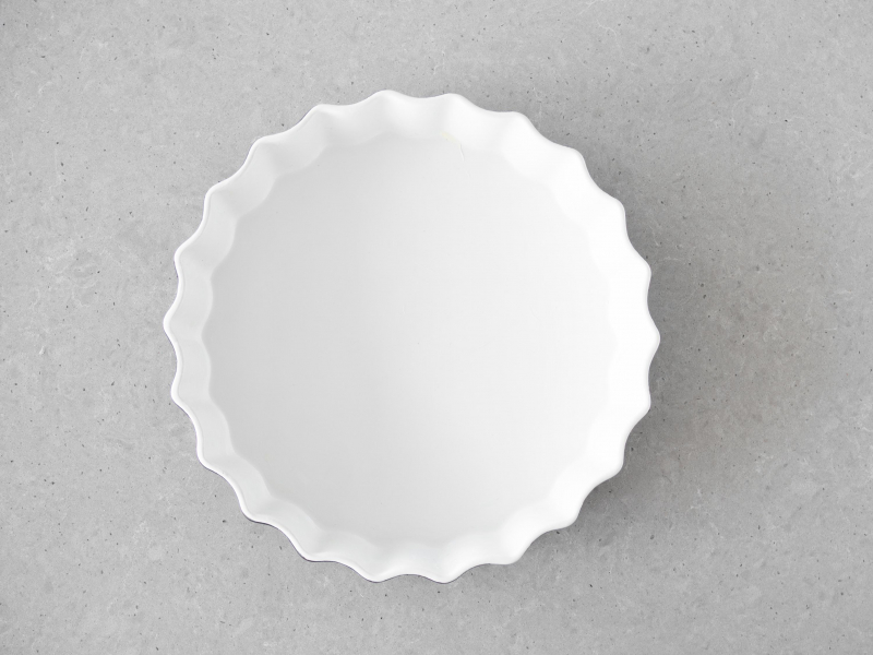 Forma ceramiczna wysmarowana masłem.